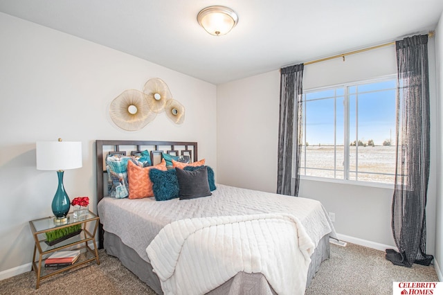 bedroom featuring carpet