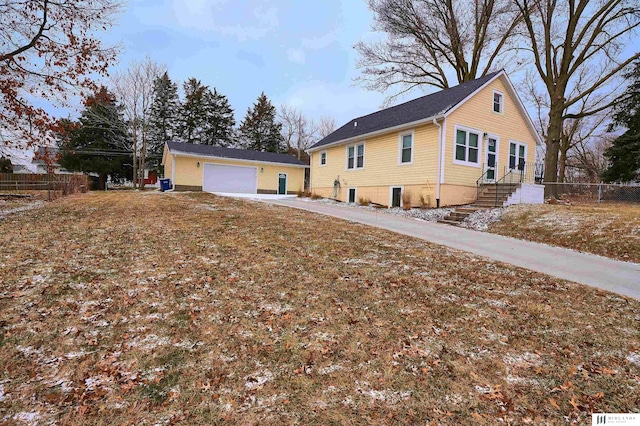 view of side of home featuring a garage