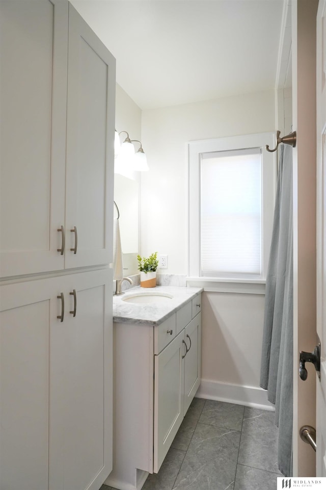 bathroom featuring vanity and tile patterned floors