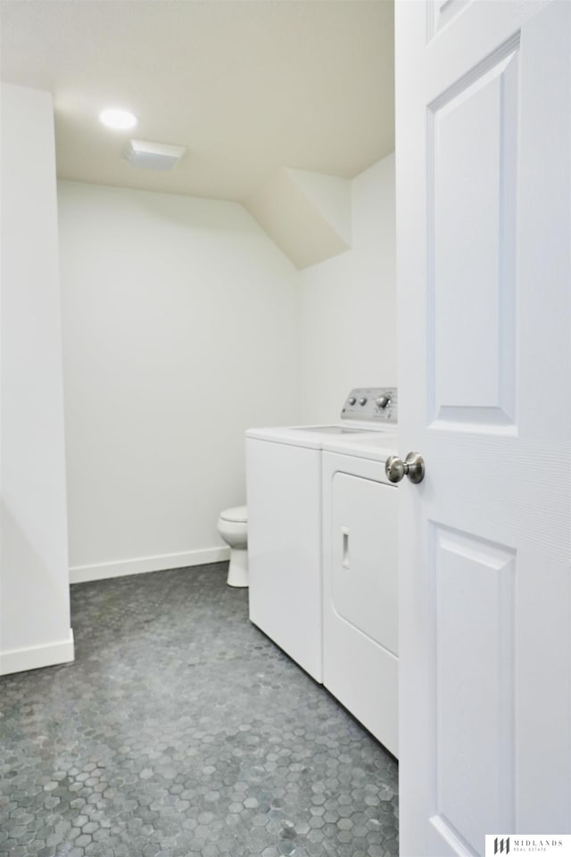 laundry area with independent washer and dryer