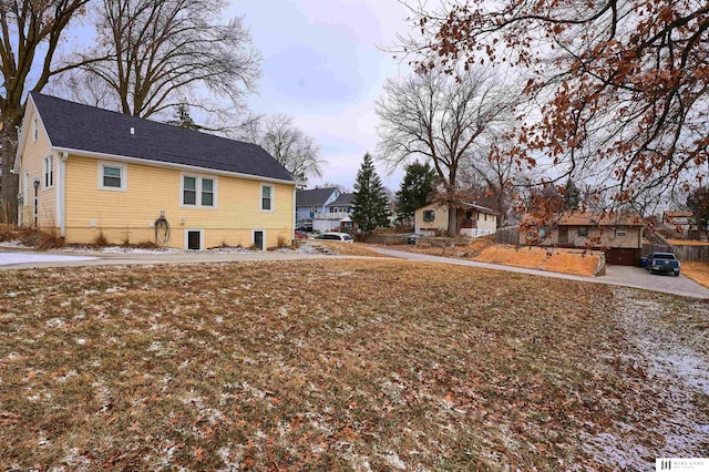 view of property exterior featuring a yard