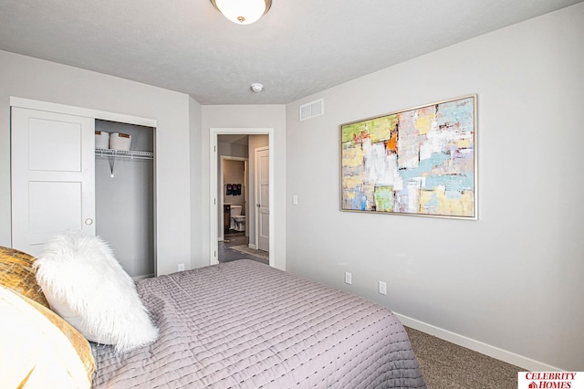 bedroom with a closet and carpet flooring