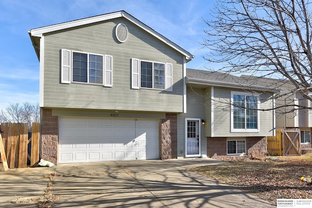 split level home featuring a garage