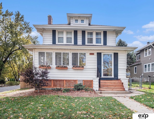 view of front property with a front lawn