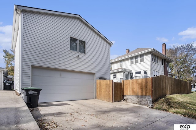 view of side of property featuring a garage