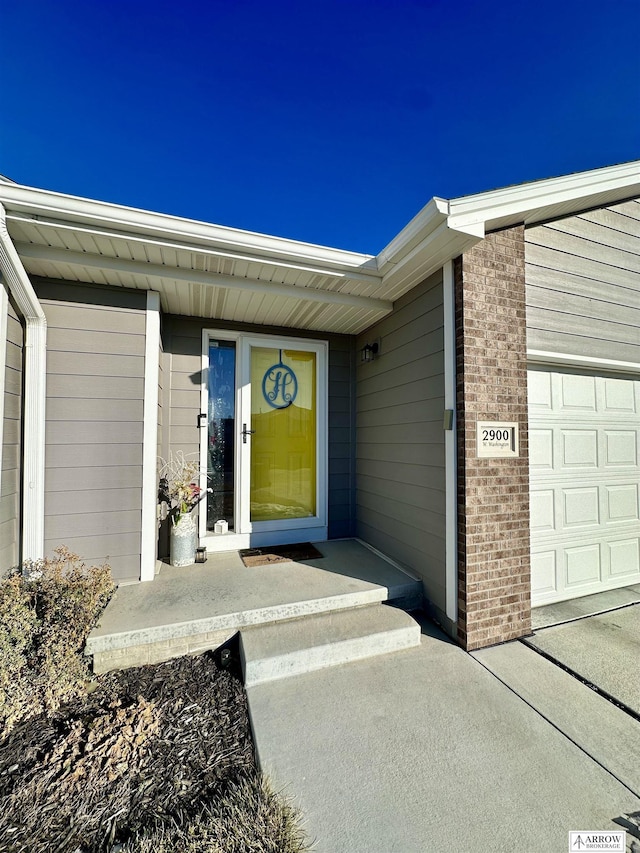 property entrance featuring a garage