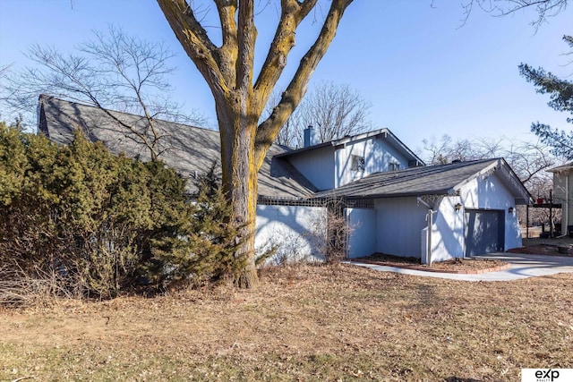 view of home's exterior featuring a garage