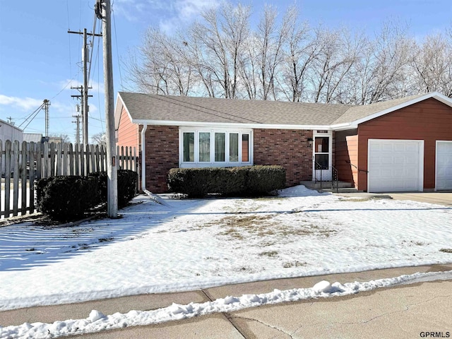 single story home with a garage