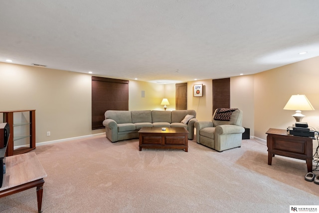 living room featuring light carpet