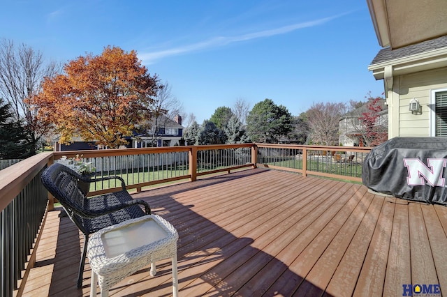 wooden terrace with grilling area