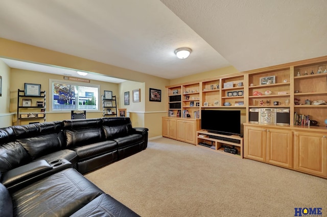 carpeted living room featuring a textured ceiling