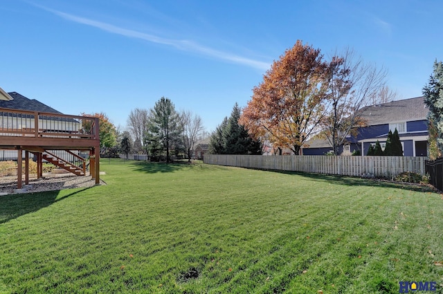 view of yard with a deck