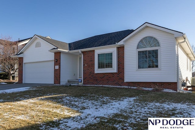 single story home featuring a garage