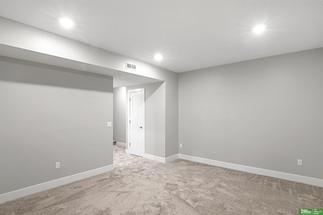 basement with carpet flooring