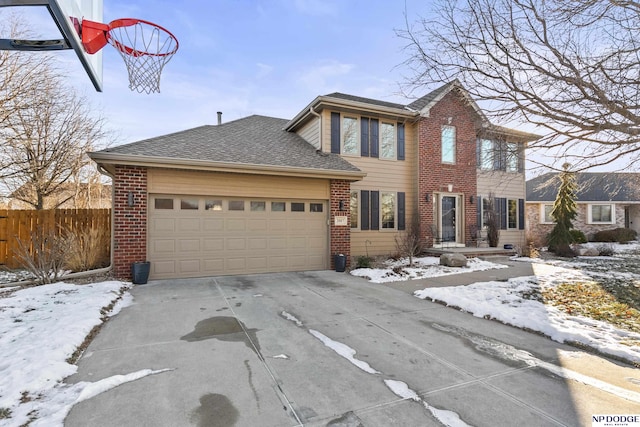 view of front of property with a garage