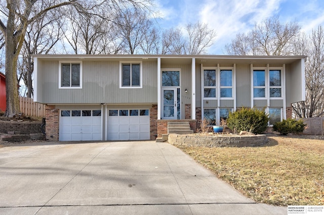 bi-level home featuring a garage