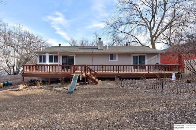 rear view of property with a deck