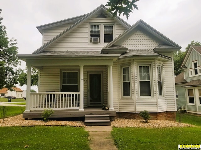 view of front of property featuring covered porch