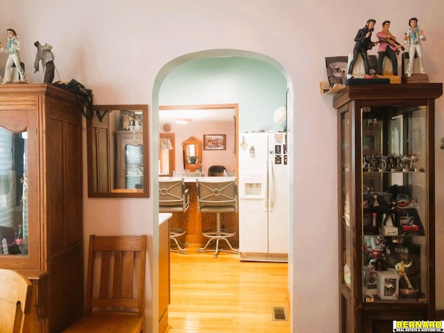 corridor featuring hardwood / wood-style flooring