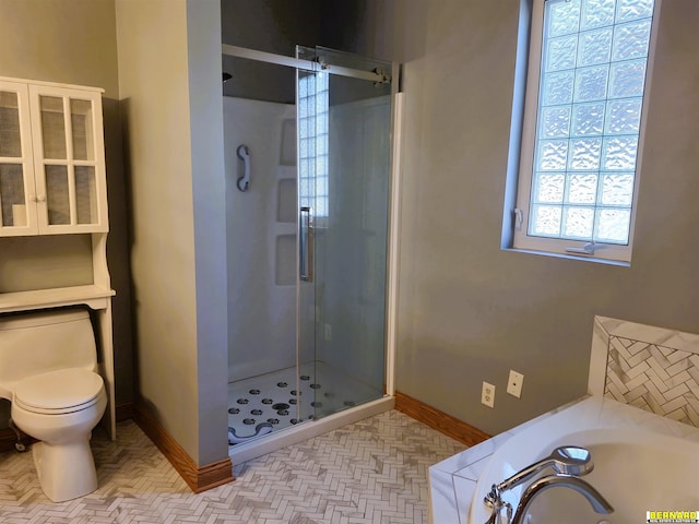 bathroom with plus walk in shower and toilet