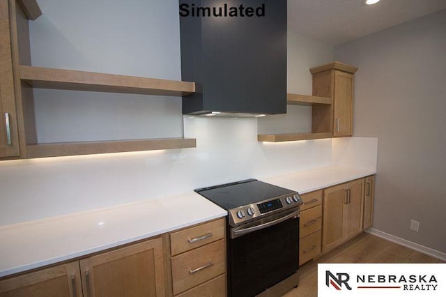 kitchen featuring light hardwood / wood-style flooring and electric stove