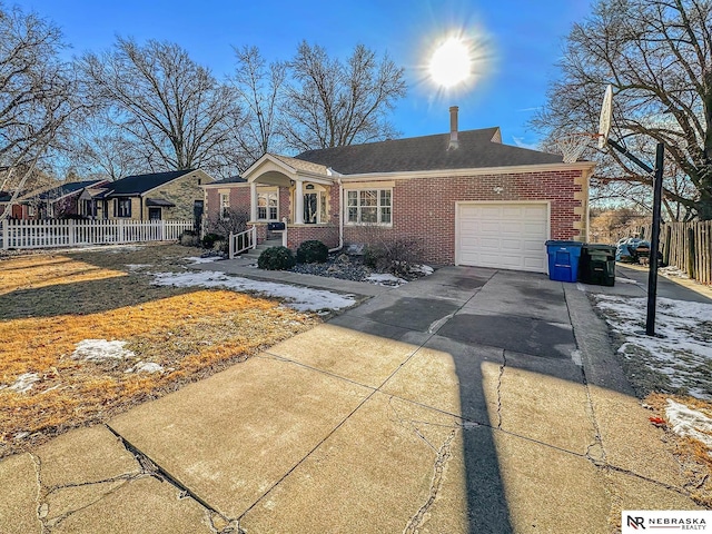 single story home with a garage