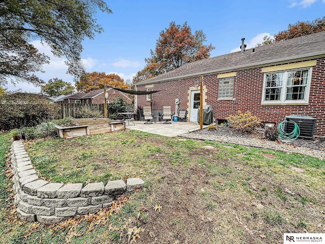 back of house featuring central AC and a patio