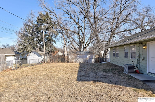 view of yard featuring central air condition unit