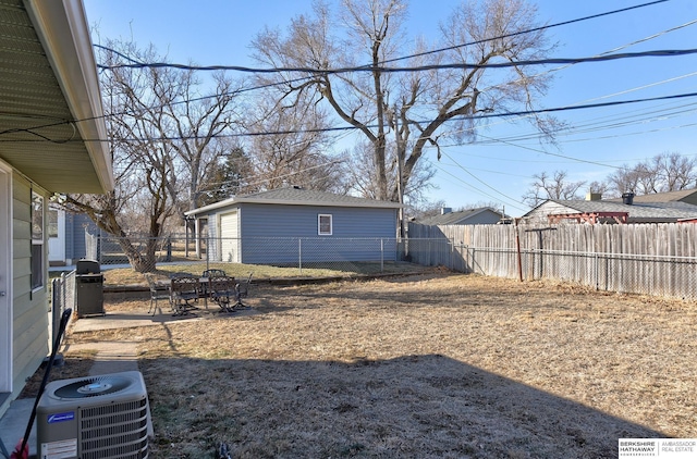 view of yard with central AC unit