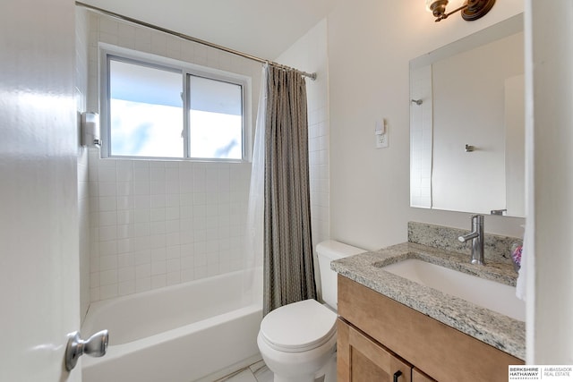 full bathroom featuring toilet, shower / bath combo, and vanity