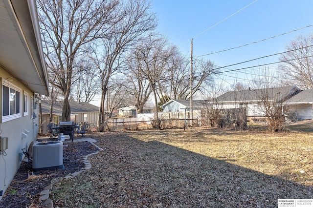 view of yard with central AC unit