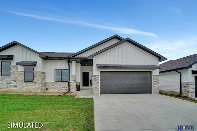 view of front of property with a garage and a front lawn