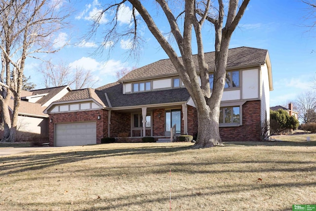 view of front of home featuring a front yard, a garage, and a porch