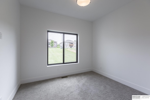 view of carpeted spare room