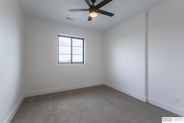 unfurnished room featuring carpet floors and ceiling fan