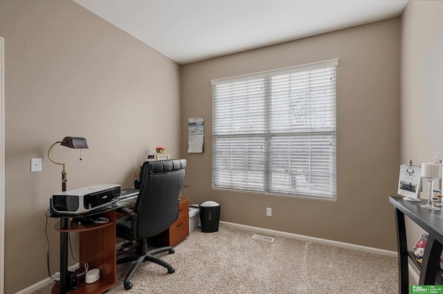 view of carpeted office space