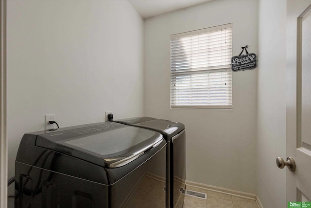 laundry room with washer and clothes dryer