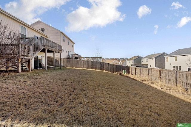 view of yard featuring a wooden deck