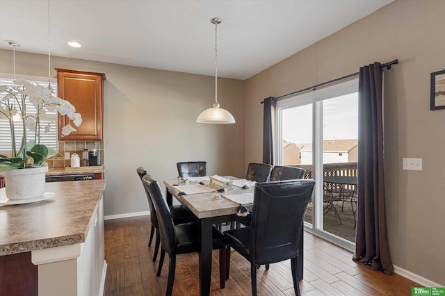 dining room featuring dark wood-type flooring