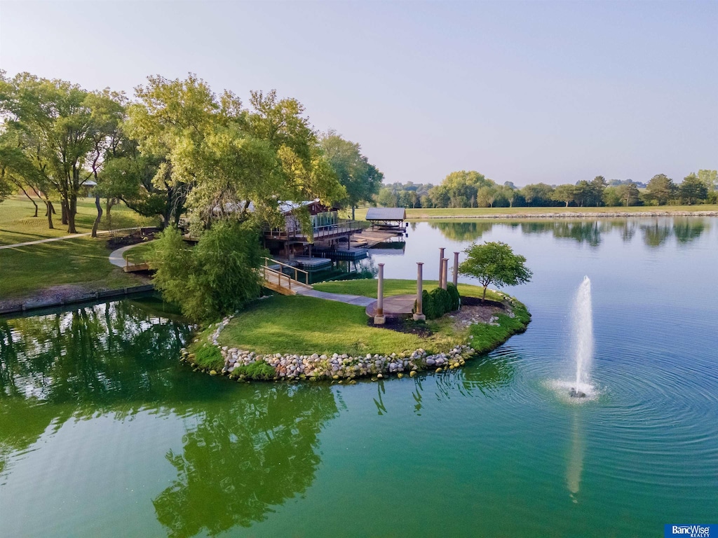 property view of water featuring a boat dock