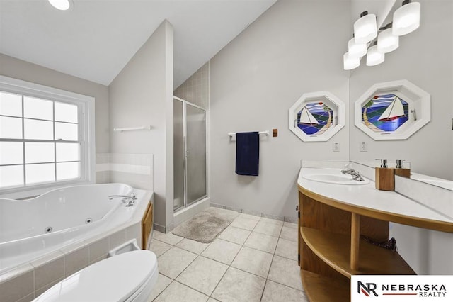 full bathroom with tile patterned flooring, vanity, separate shower and tub, and vaulted ceiling