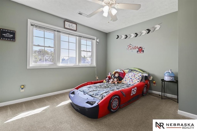 bedroom featuring ceiling fan and carpet floors