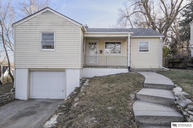 view of front facade with covered porch and a garage