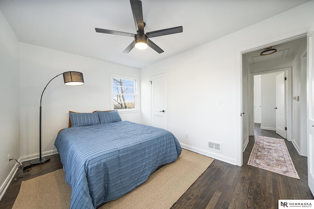 bedroom with dark wood-type flooring and ceiling fan