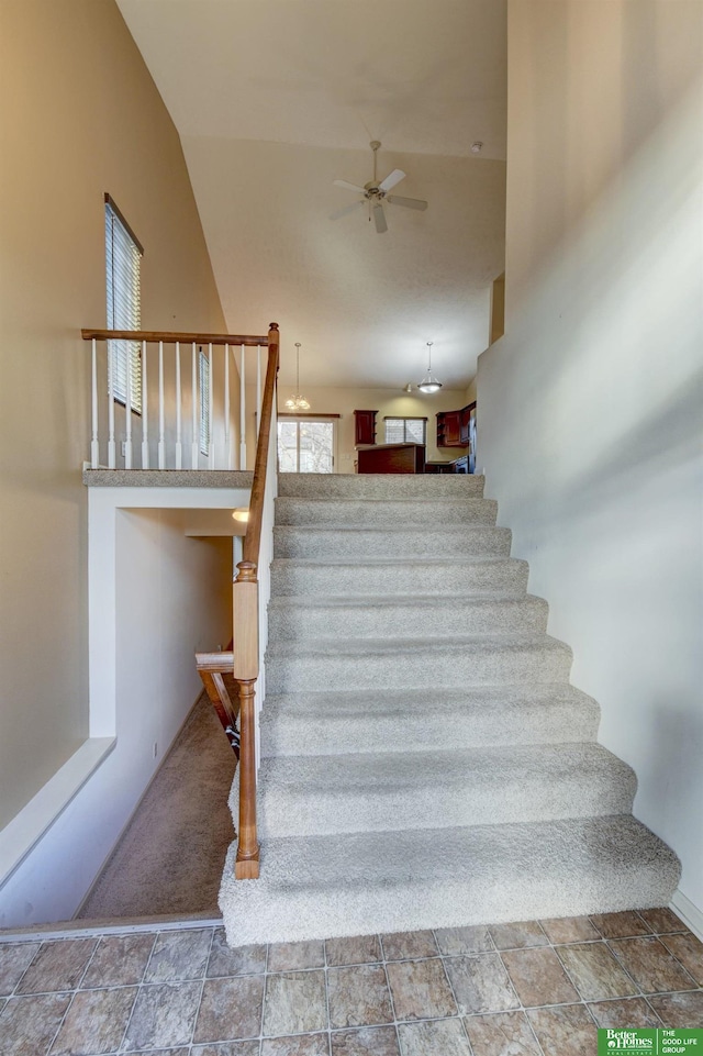 staircase with ceiling fan