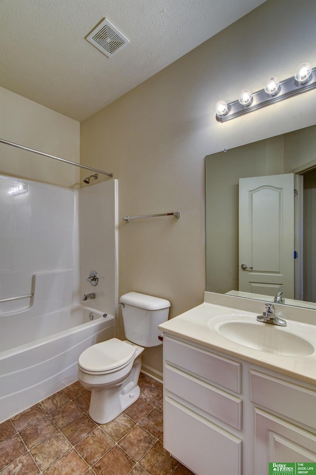 full bathroom featuring a textured ceiling, toilet, shower / bath combination, and vanity