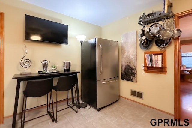 kitchen with stainless steel fridge