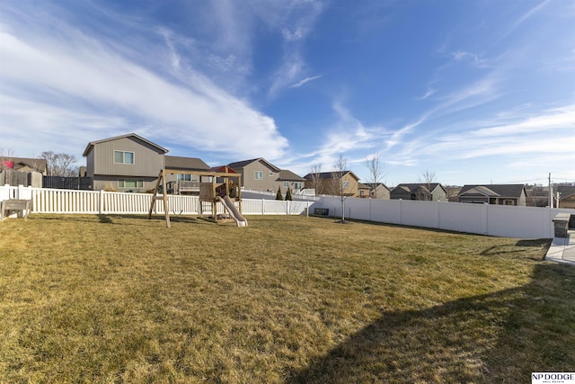 view of yard with a playground