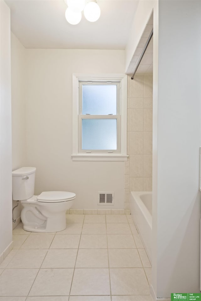 bathroom featuring toilet and tile patterned floors