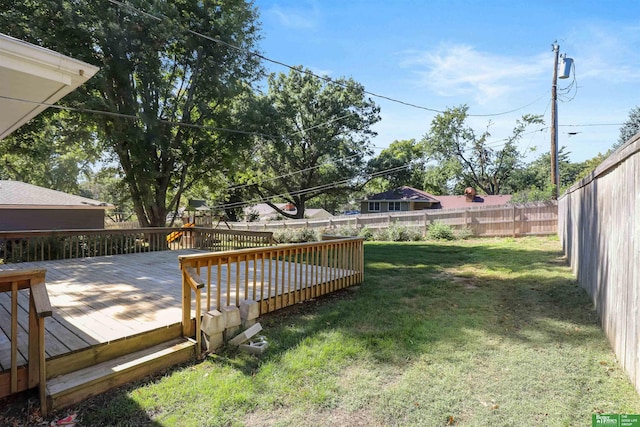 view of yard featuring a playground and a wooden deck